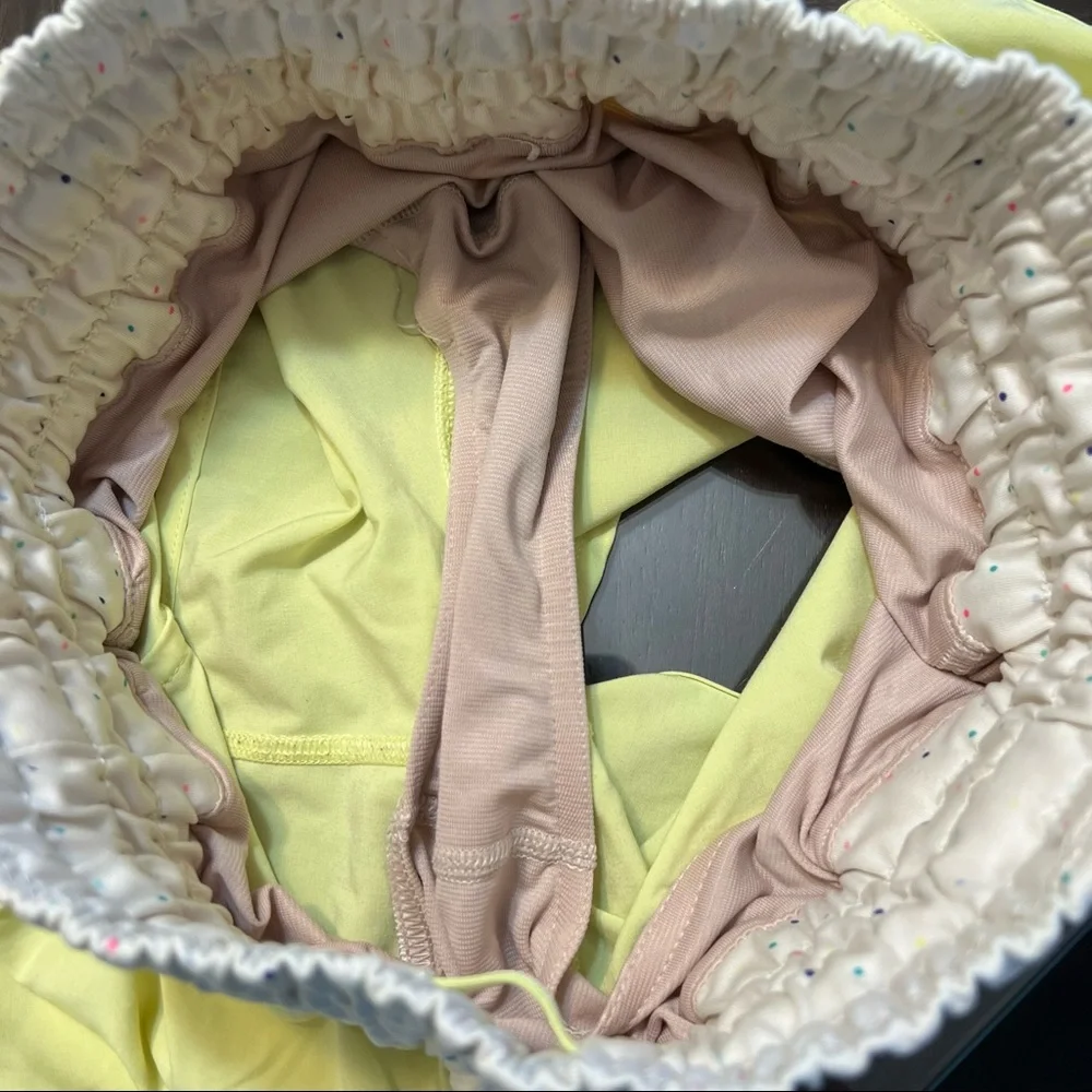Lululemon Tracker Yellow Shorts with Multicolored Dot patterned waistband